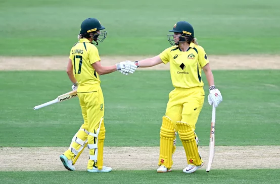 Phoebe Litchfield and Meg Lanning after a hundred run partnership